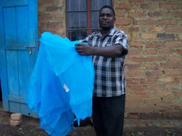 New Olyset mosquito nets being installed at Gables Vocational Centre